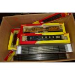 A QUANTITY OF BOXED AND UNBOXED HORNBY RAILWAYS 00 GAUGE ROLLING STOCK AND TRACK, to include