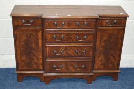 A MODERN BEVAN FUNNELL STYLE MAHOGANY BREAKFRONT SIDEBOARD, with six various drawers and two
