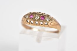 AN EARLY 20TH CENTURY 9CT GOLD, RUBY AND DIAMOND BOAT RING, set with a central single cut diamond
