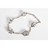 A SILVER PANDORA CHARM BRACELET, the curb link bracelet with four charms such as a colourless