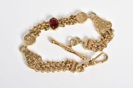 A 9CT GOLD ALBERTINA CHAIN, designed with a central oval cut garnet interspaced either side with