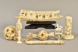 A LATE 19TH CENTURY CHINESE CARVED IVORY PUZZLE BALL ON CHAIN, with fish hook, carved links above