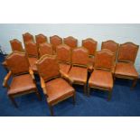 A SET OF FIFTEEN EARLY 20TH CENTURY OAK BOARDROOM CHAIRS including two carver chairs with light
