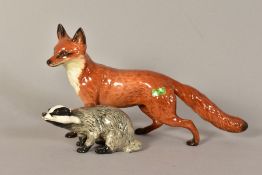 A BESWICK FOX, standing No1016A and a Beswick Badger, male No3393 (2)