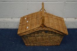 A WICKER PICNIC BASKET with contents