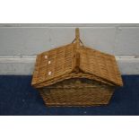 A WICKER PICNIC BASKET with contents
