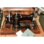 AN EARLY 20TH CENTURY 'FEDERATION' FAMILY HAND SEWING MACHINE, English make, transfer printed floral