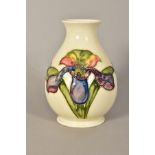 A MOORCROFT POTTERY VASE, Orchid pattern on cream ground, impressed and painted marks to base,