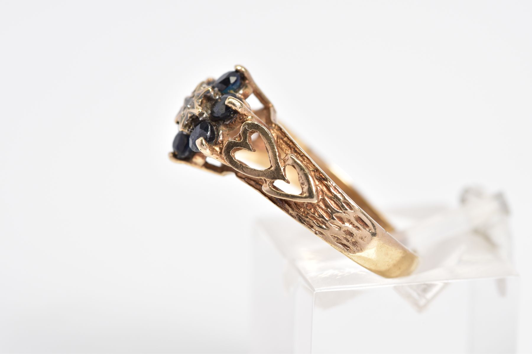 A 9CT GOLD SAPPHIRE AND DIAMOND CLUSTER RING, the cluster set with a single cut diamond within a - Image 2 of 3