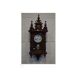 AN EARLY 20TH CENTURY WALNUT VIENNA WALL CLOCK, height 84cm