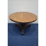 A VICTORIAN MAHOGANY CIRCULAR TILT TOPPED BREAKFAST TABLE on an octagonal pillar, triform base