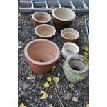 FOUR GLAZED PLANT POTS, a composite plant pot and two other plant pots, largest pot approximate 39cm