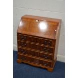 A MODERN YEWWOOD BUREAU with four drawers, width 75cm x depth 44cm x height 95cm