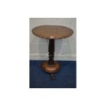 AN EARLY VICTORIAN MAHOGANY CIRCULAR TOPPED OCCASIONAL TABLE on a hexagonal tapering and tulip