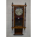 A LATE 19TH CENTURY ROSEWOOD AND CROSSBANDED WALL CLOCK, flanked by turned pillars, height 93cm (