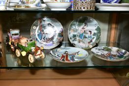 FOUR COLLECTORS PLATES PRINTED WITH ORIENTAL SCENES AND CERAMIC MODELS OF VINTAGE CARS, etc,