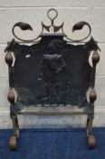 AN EARLY 20TH CENTURY ART NOUVEAU COPPERED FIRE SCREEN with a knight moulded to the panel, width