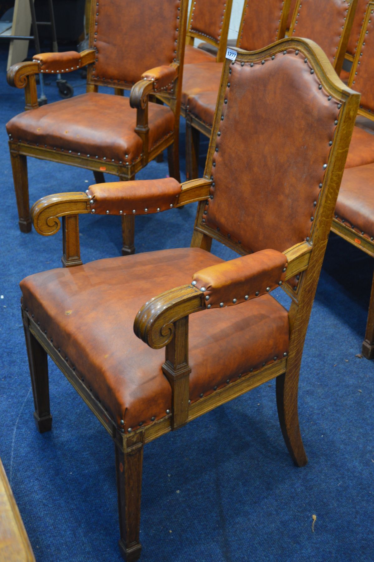 A SET OF FIFTEEN EARLY 20TH CENTURY OAK BOARDROOM CHAIRS including two carver chairs with light - Image 2 of 3