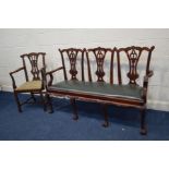 A 20TH CENTURY CHIPPENDALE STYLE THREE SEATER SOFA with a heavily carved mahogany frame, with