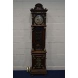 A LATE 19TH CENTURY OAK POLYPHON LONGCASE CLOCK, arched and scrolled pediment above a moulded