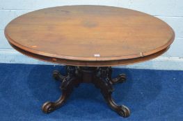 A LATE VICTORIAN MAHOGANY AND WALNUT OVAL LOO TABLE, on a scrolled base, approximate width 135cm x