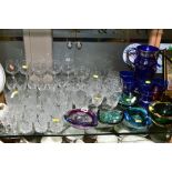A GROUP OF CLEAR AND COLOURED GLASSWARE, including Brierley Crystal tumblers, coloured glass