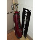SPORTING INTEREST, a 'To Spectator Balcony' sign, with a golf bag, containing five golf clubs,