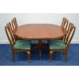 A MODERN CHERRYWOOD EXTENDING PEDESTAL DINING TABLE, with a single fold out leaf, approximate