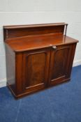 A VICTORIAN MAHOGANY PANELLED TWO DOOR CHIFFONIER, with a raised back on bobbin turned supports,