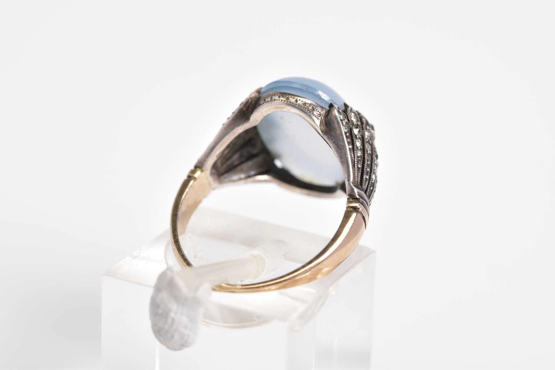 A MOONSTONE CABOCHON RING, the yellow metal ring designed with an oval cut cabochon moonstone, - Image 3 of 3