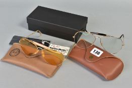 TWO PAIRS OF RAY-BAN GLASSES, both of out doorsmandesign, the first with a gold coloured frame and