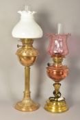 AN EARLY 20TH CENTURY HINKS & SONS BRASS BASED OIL LAMP, with chimney, plain white opaque shade,