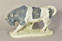 A ROYAL COPENHAGEN PORCELAIN FIGURE OF A BULL, (seconds), designed by Knud Kyhn, with incised