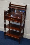 A MODERN MAHOGANY HALL STAND, with a gallery and mirror top, single drawer and shelves, width 51cm x
