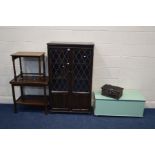 A PRIORY DARK OAK LEAD GLAZED AND LINENFOLD TWO DOOR BOOKCASE (sd to glass), approximate width