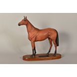 A BESWICK CONNOISSEUR HORSE, 'Red Rum' No2510, on wooden plinth