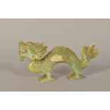 A MODERN CARVED GREEN QUARTZ DRAGON, length 13cm (chip to tail)