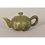 A SMALL CHINESE NEPHRITE TEAPOT, embossed character marks to body and one to base, height 6.5cm