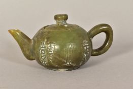 A SMALL CHINESE NEPHRITE TEAPOT, embossed character marks to body and one to base, height 6.5cm