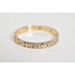 A 9CT GOLD DIAMOND FULL ETERNITY RING, the detailed band set with single cut diamonds