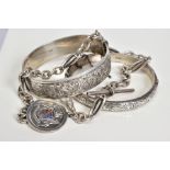 TWO SILVER BANGLES AND A SILVER ALBERT CHAIN, the first hinged bangle of an engraved floral design