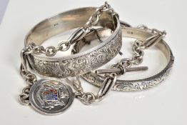 TWO SILVER BANGLES AND A SILVER ALBERT CHAIN, the first hinged bangle of an engraved floral design