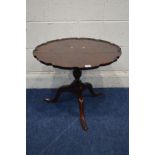 A REPRODUCTION BURR WALNUT CIRCULAR TOPPED TRIPOD TABLE, with a wavy top, diameter 61cm x height