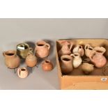 A COLLECTION OF ANCIENT ROMAN JUGS OF VARYING FORMS, beakers, amphora's, etc, heights range from 8cm