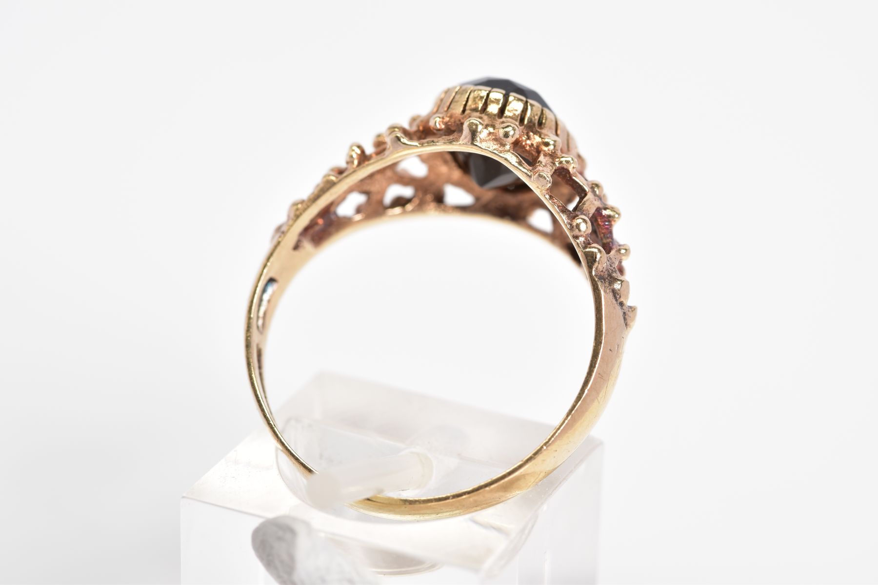 A 9CT GOLD SMOKEY QUARTZ RING, designed with a claw set oval cut smokey quartz and open work - Image 3 of 3