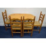 A MODERN PITCH PINE KITCHEN TABLE, with four rush seated chairs (s.d) (5)