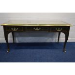 A MODERN LIBRARY TABLE BADGED COLECTOR EDITION BY BAKER, model 3631 Louis XV desk, with brass ogee