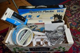 A QUANTITY OF NINTENDO Wii AND COMPATIBLE ITEMS, with Wii and power supply to include boxed 15 in