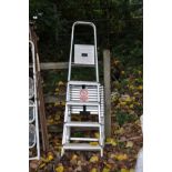 AN EXTEND AND CLIMB TELESCOPIC ALUMINIUM LADDER, approximate length 380cm, and a pair of aluminium