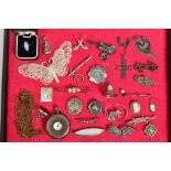 A SELECTION OF SILVER BROOCHES PENDANTS, coin brooches, fobs, etc, including a lace needlework